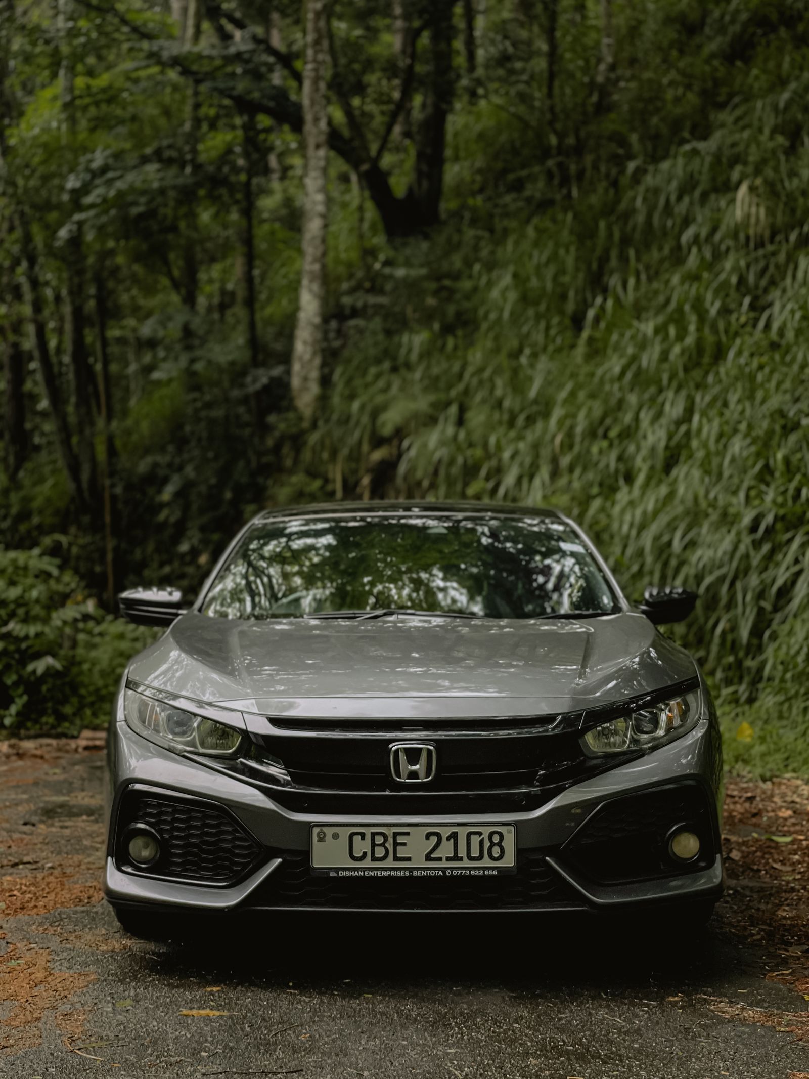 Gray Honda Civic sedan, front view